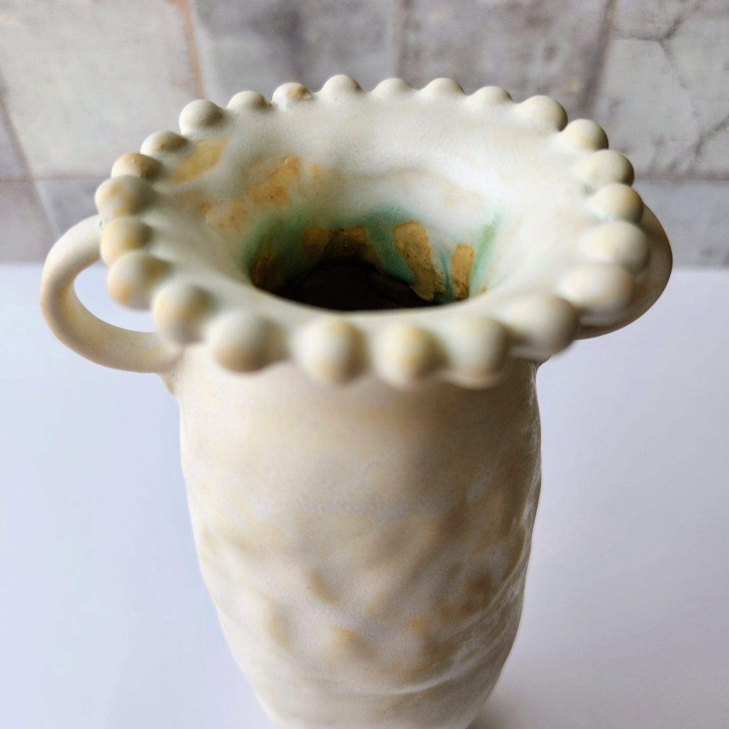 Tall Cream Pinched Vase by Rene Stratton