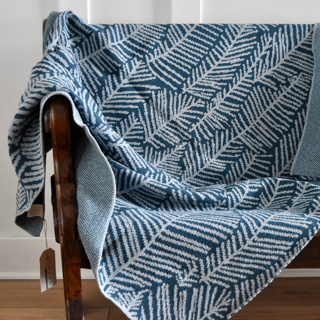 Leaf Melody Throw Blanket in Blue by Elodie Blanchard for In 2 Green