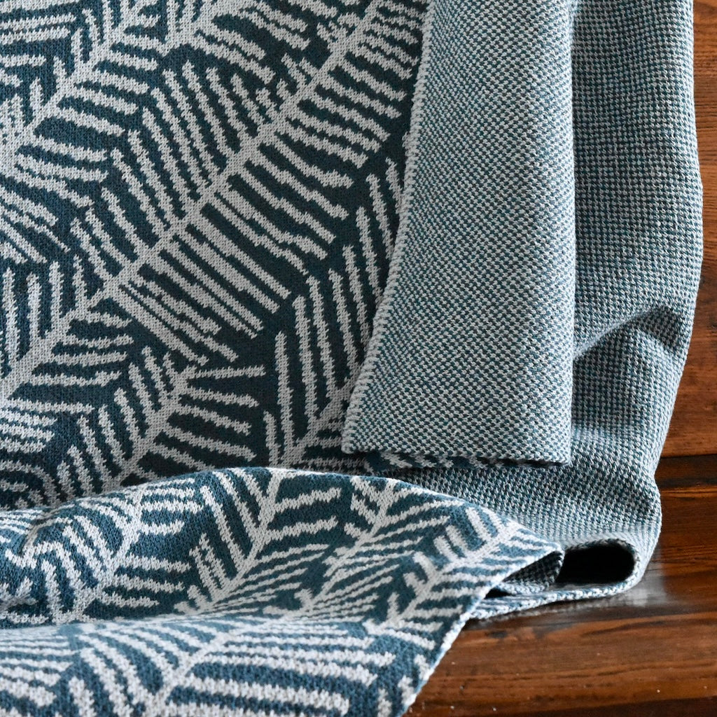 Leaf Melody Throw Blanket in Blue by Elodie Blanchard for In 2 Green