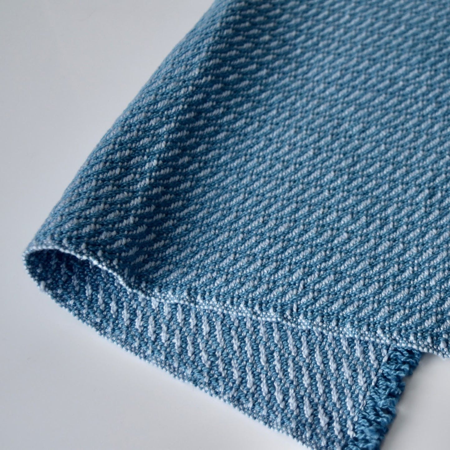 Placemat in Blue and Grey by Kristina Nichols