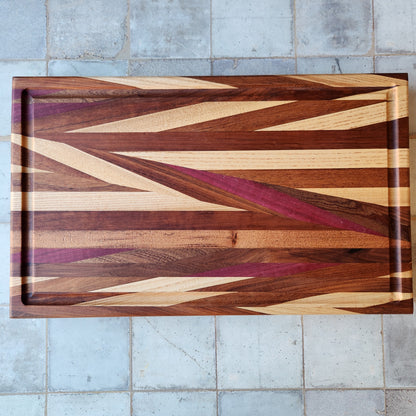 Cutting Board in Purple Heart, Padauk, Black Walnut, Sapele, and Mahogany by Rhino Woodworking