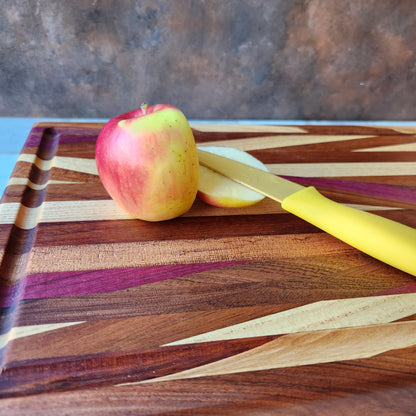 Cutting Board in Purple Heart, Padauk, Black Walnut, Sapele, and Mahogany by Rhino Woodworking