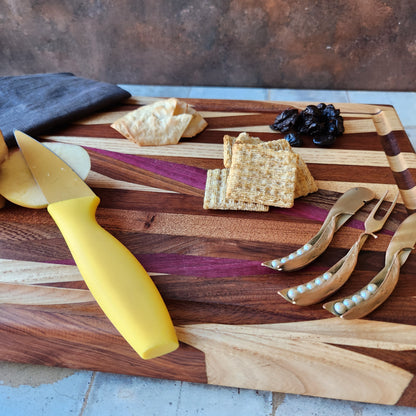 Cutting Board in Purple Heart, Padauk, Black Walnut, Sapele, and Mahogany by Rhino Woodworking
