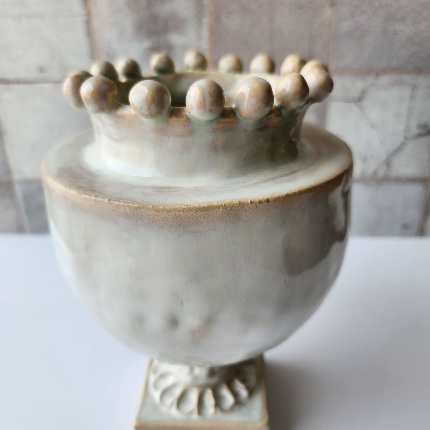 Round Cream Pinched Vase by Rene Stratton