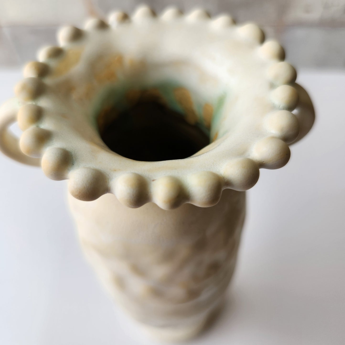 Tall Cream Pinched Vase by Rene Stratton