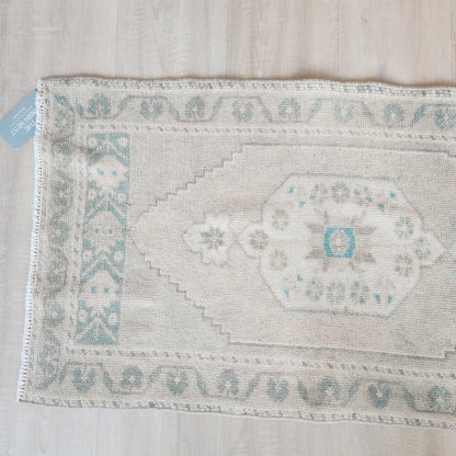 Vintage Hand Knotted Rug in Blush, Eucalyptus, and Teal by Tara Dennis Design