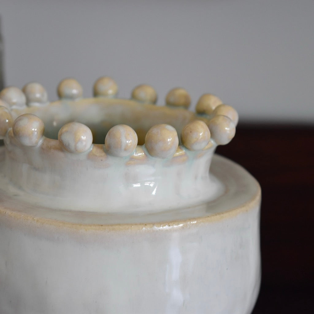 Round Cream Pinched Vase by Rene Stratton
